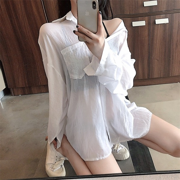 Pikk naiste särk klassikalise krae ja taskutega