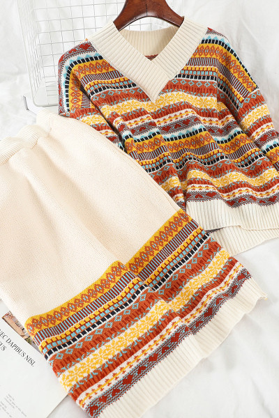 Värviline naiste komplekt, mis sisaldab kampsunit ja kõrge vöökohaga seelikut