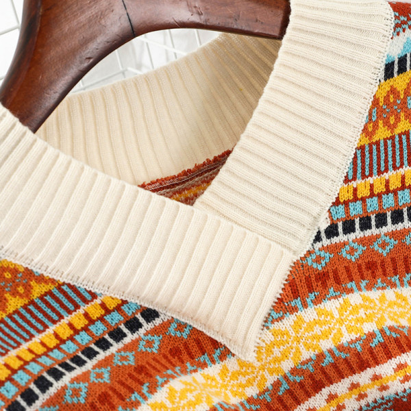 Värviline naiste komplekt, mis sisaldab kampsunit ja kõrge vöökohaga seelikut