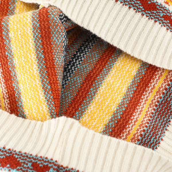 Värviline naiste komplekt, mis sisaldab kampsunit ja kõrge vöökohaga seelikut