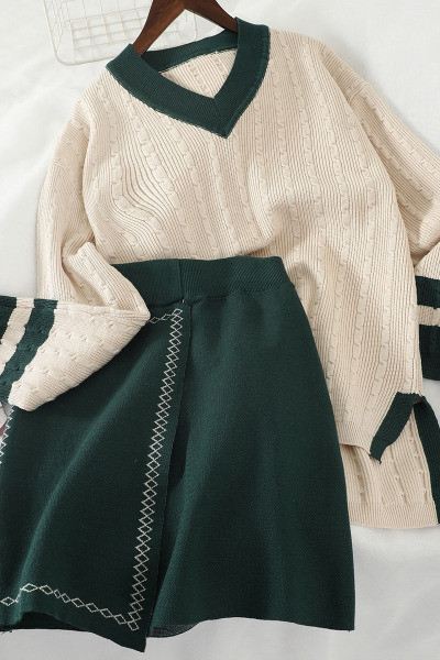 Naiste kootud komplekt, mis sisaldab V-kaelusega kampsunit ja kõrge vöökohaga seelikut