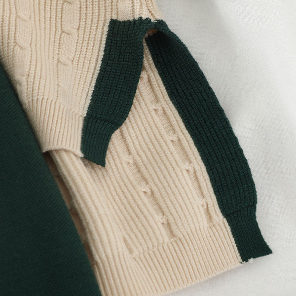 Naiste kootud komplekt, mis sisaldab V-kaelusega kampsunit ja kõrge vöökohaga seelikut