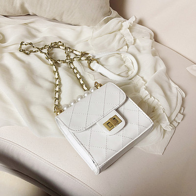 Moodne pika sanga ja pärlitega kaunistusega naistekott