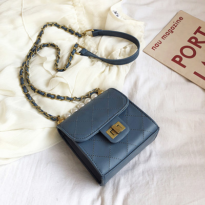 Moodne pika sanga ja pärlitega kaunistusega naistekott