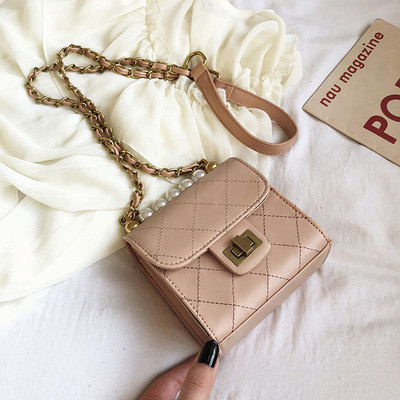 Moodne pika sanga ja pärlitega kaunistusega naistekott