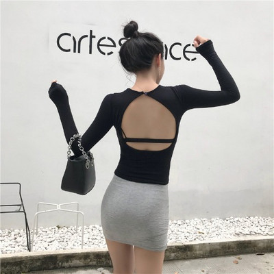 Kevadine naiste pluus ovaalse kaelusega ja lahtise seljaosaga