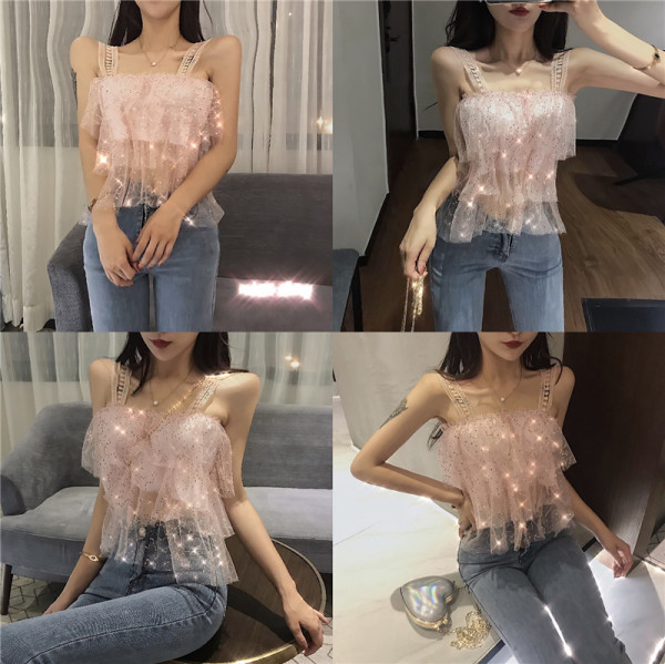 Modern női felső flitterekkel és csipkepántokkal