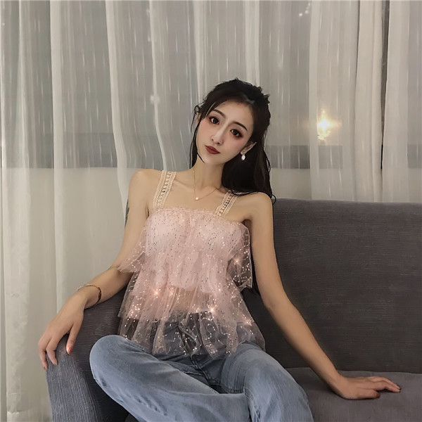 Modern női felső flitterekkel és csipkepántokkal