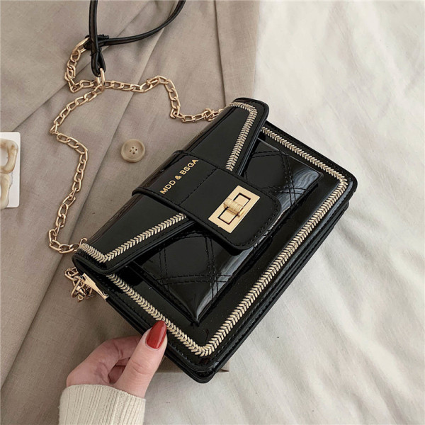 Modern női lakkbőr táska hosszú fém fogantyúval