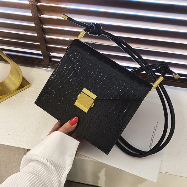 Eko bőrből készült stílusos női táska hosszú füllel