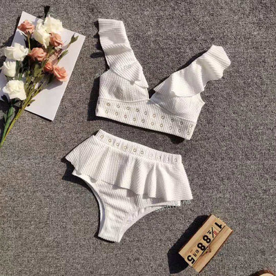 Új, kétrészes fürdőruha, magas derékkal és fém elemekkel