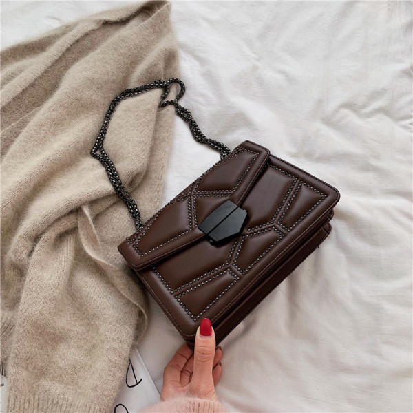 Pika metallist käepidemega ökonahast vabaaja naistekott