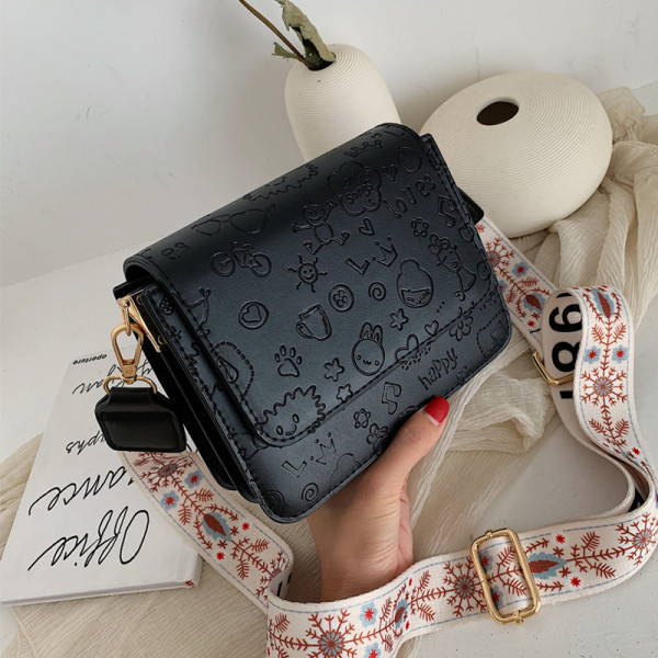 Reljeefse katte ja laia värvilise käepidemega vabaaja naiste nahkkott