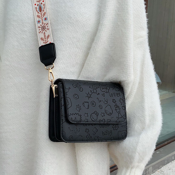 Reljeefse katte ja laia värvilise käepidemega vabaaja naiste nahkkott