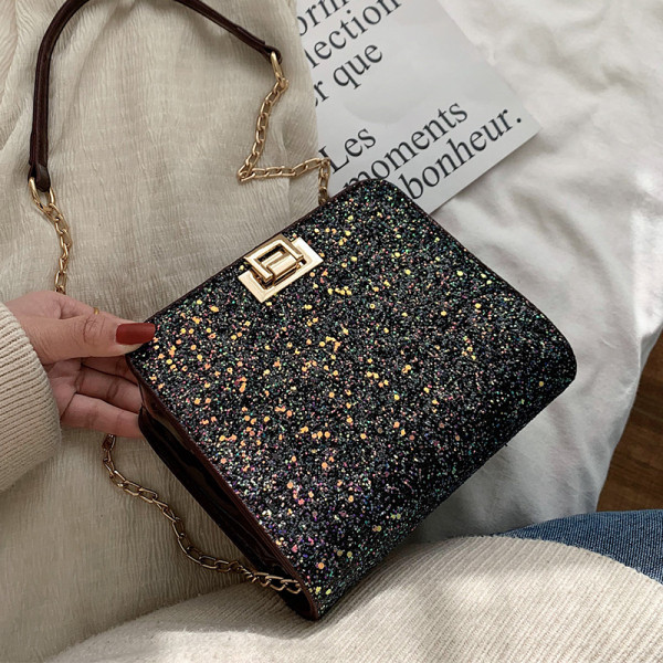 Modernus moteriškas krepšys su blizgiomis dalelėmis ir ilga rankena