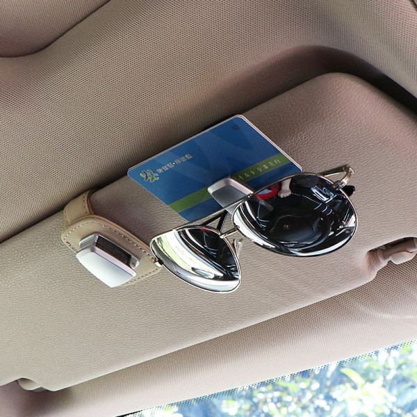 Automobilinis stovas tinka atvirutėms ir akiniams nuo saulės