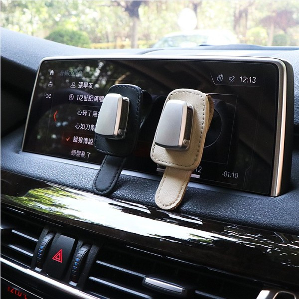 Automobilinis stovas tinka atvirutėms ir akiniams nuo saulės