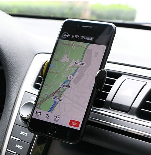 Suport universal pentru telefon montat pe conducta de aer al mașinii