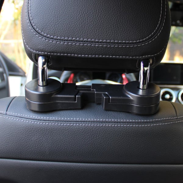 Daugiafunkcinis kablys automobilio sėdynės atlošui