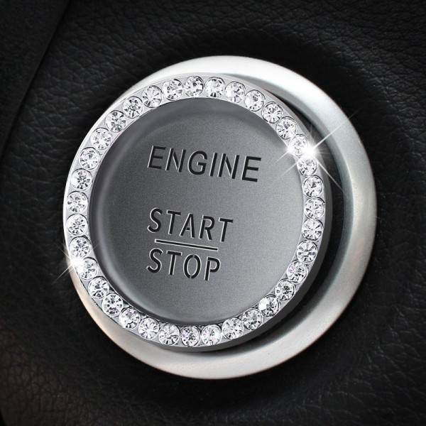 Dekoratyvinis automobilio mygtuko apkalimas akmenukais