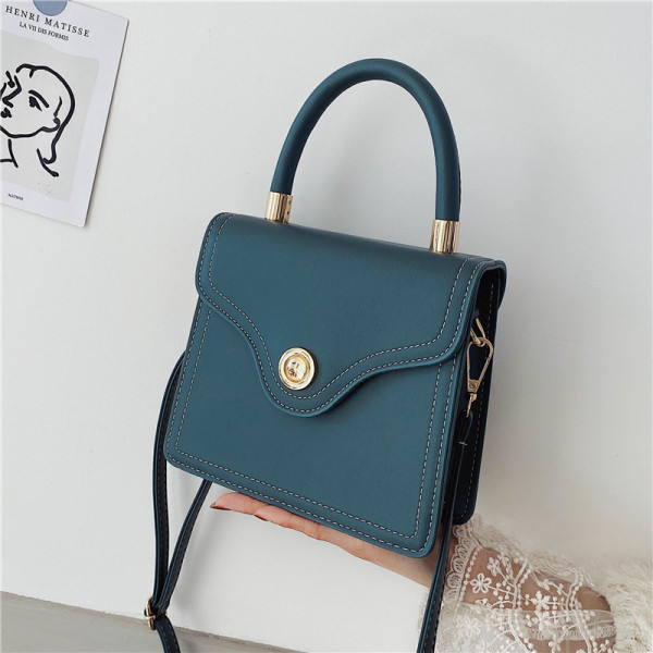 Női bőrtáska hosszú és rövid fogantyúval