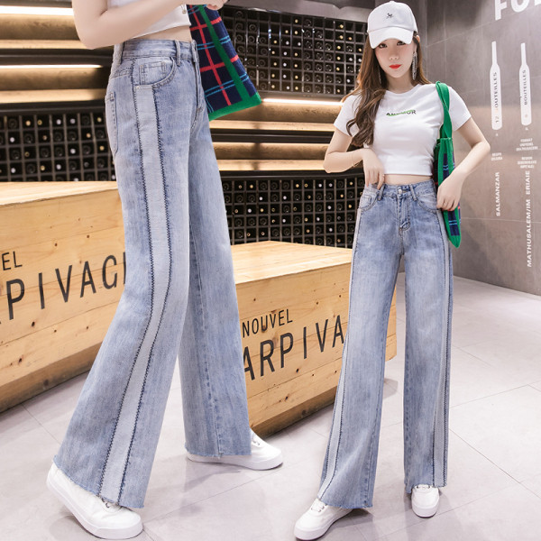 Széles női farmer magas derékkal és zsebekkel