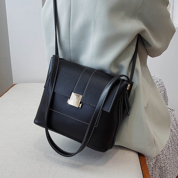 Női alkalmi táska eko bőrből, hosszú füllel