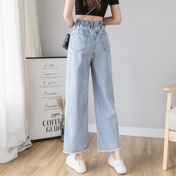 Széles női farmer fűzővel és magas derékkal