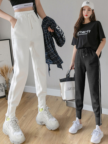 Női alkalmi nadrág nyakkendővel és cipzárral