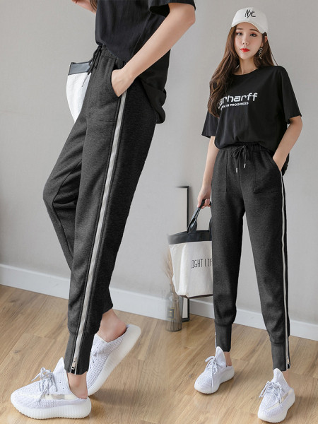 Női alkalmi nadrág nyakkendővel és cipzárral