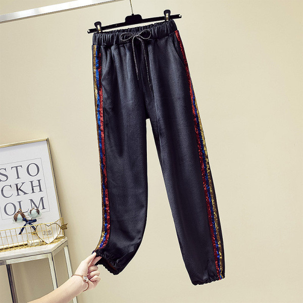 Modern női bársony nadrág elasztikus derékkal, puha béléssel és színes flitterekkel