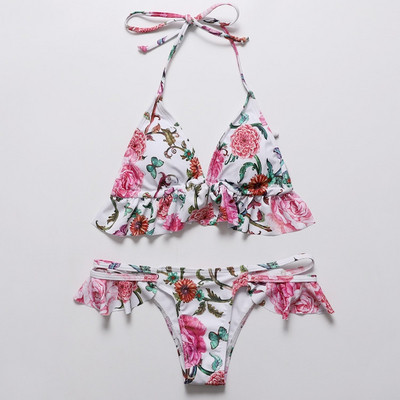 Modern női fürdőruha virágmintával és fürtökkel