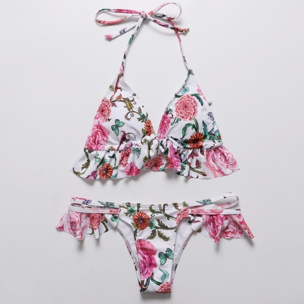 Modern női fürdőruha virágmintával és fürtökkel