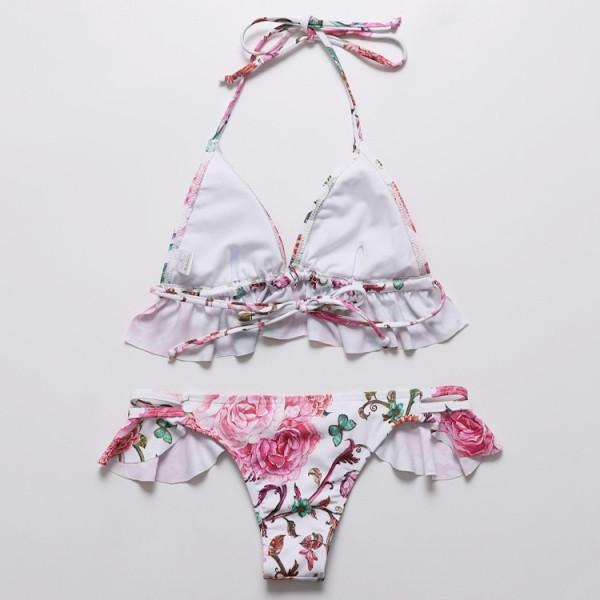 Modern női fürdőruha virágmintával és fürtökkel