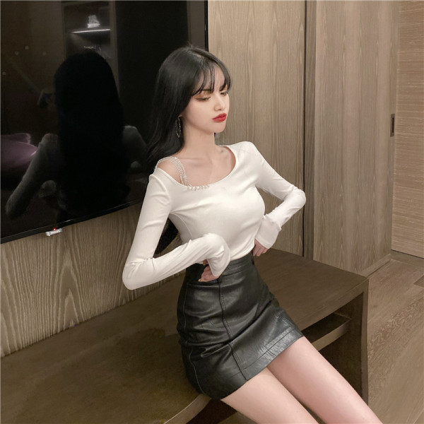 Női blúz hosszú ujjal és kövekkel