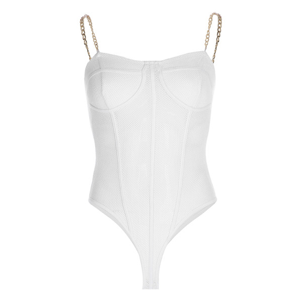 Átlátszó női fehér test fém pántokkal