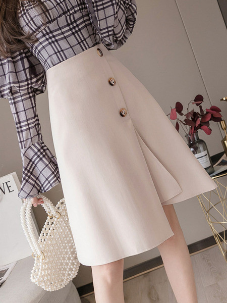 Stílusos női szoknya magas derékkal és gombokkal - aszimmetrikus modell