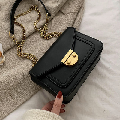 Moderni moteriška rankinė su ilga metaline grandinėle