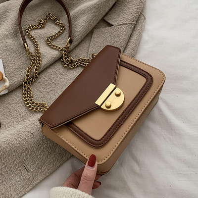 Moderni moteriška rankinė su ilga metaline grandinėle