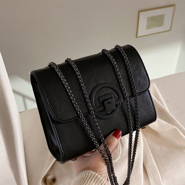 Öko bőrből készült négyzet alakú női táska hosszú füllel