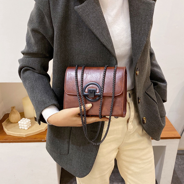 Öko bőrből készült négyzet alakú női táska hosszú füllel