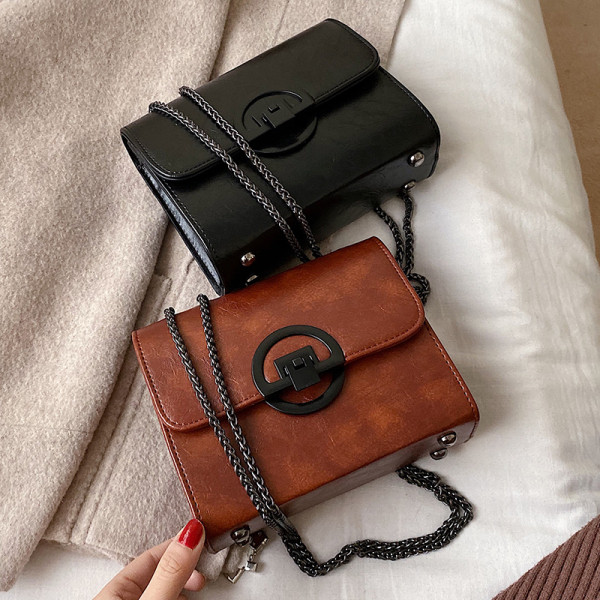 Öko bőrből készült négyzet alakú női táska hosszú füllel