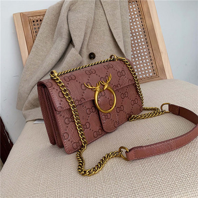 Naiste kaasaegne pika sanga ja metallist kinnitusega ökonahast kott