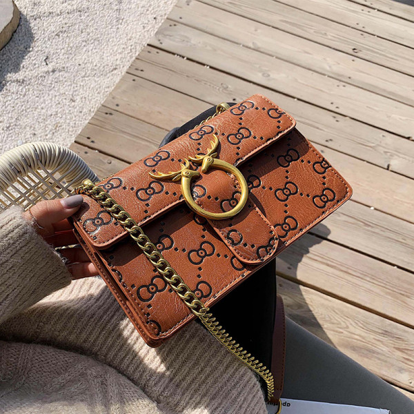 Naiste kaasaegne pika sanga ja metallist kinnitusega ökonahast kott