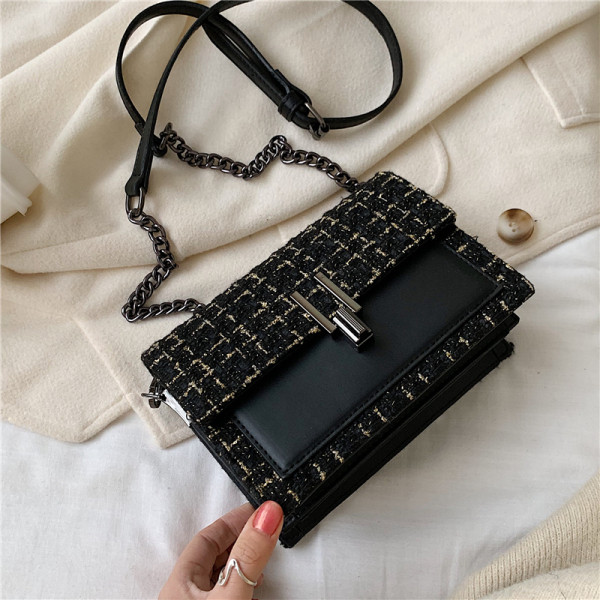 Modern női táska hosszú fém fogantyúval