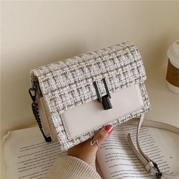 Modern női táska hosszú fém fogantyúval