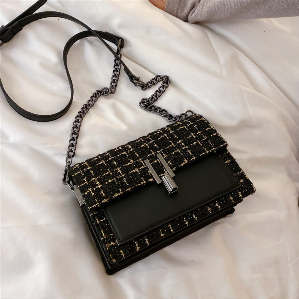 Modern női táska hosszú fém fogantyúval