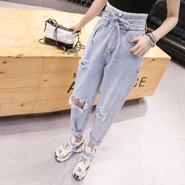 Női széles farmer fűzős, szakadt motívumokkal