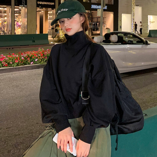 Új modell női blúz pólógallérral és széles ujjakkal