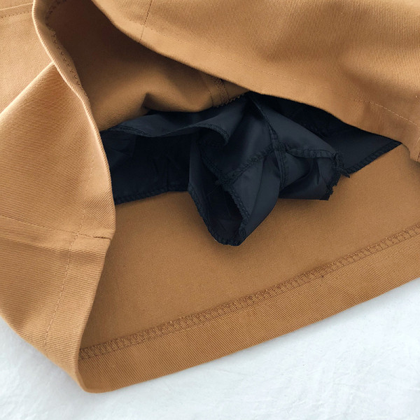 Női farmerszoknya magas derékkal és zsebekkel